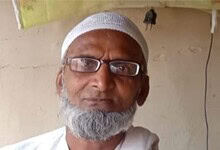 Elderly man with glasses and white beard, attacked in Bihar over communal remarks.