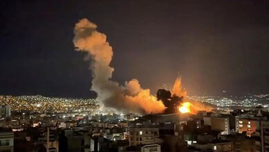 Explosion in Saudi residential area at night with smoke and fire.