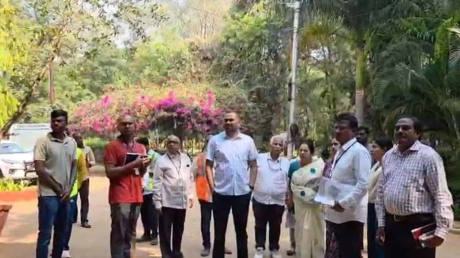 GHMC officials inspecting the play area at Indira Park in Hyderabad for cleaning and maintenance.