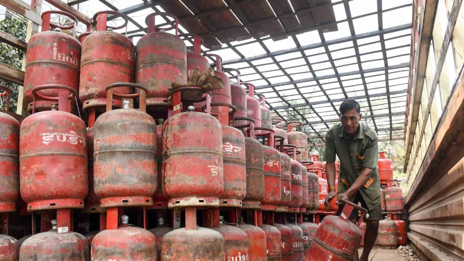 Large stock of LPG gas cylinders stored in a warehouse for distribution.