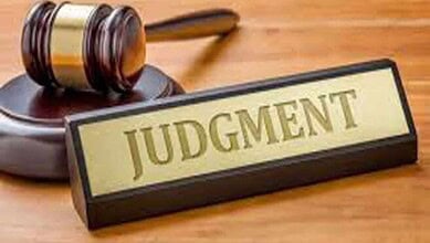 Gavel and "Judgment" sign at court, related to sexual assault case involving minor girl.