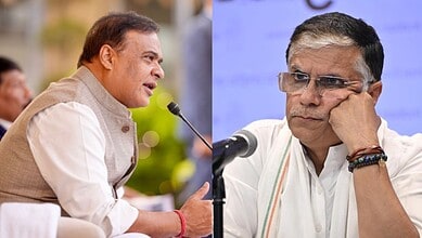 Pawan Khera and Himanta in discussion during press conference, highlighting political tensions.