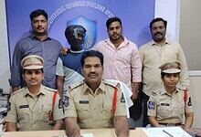 Police officers and officials at a press conference in Hyderabad.