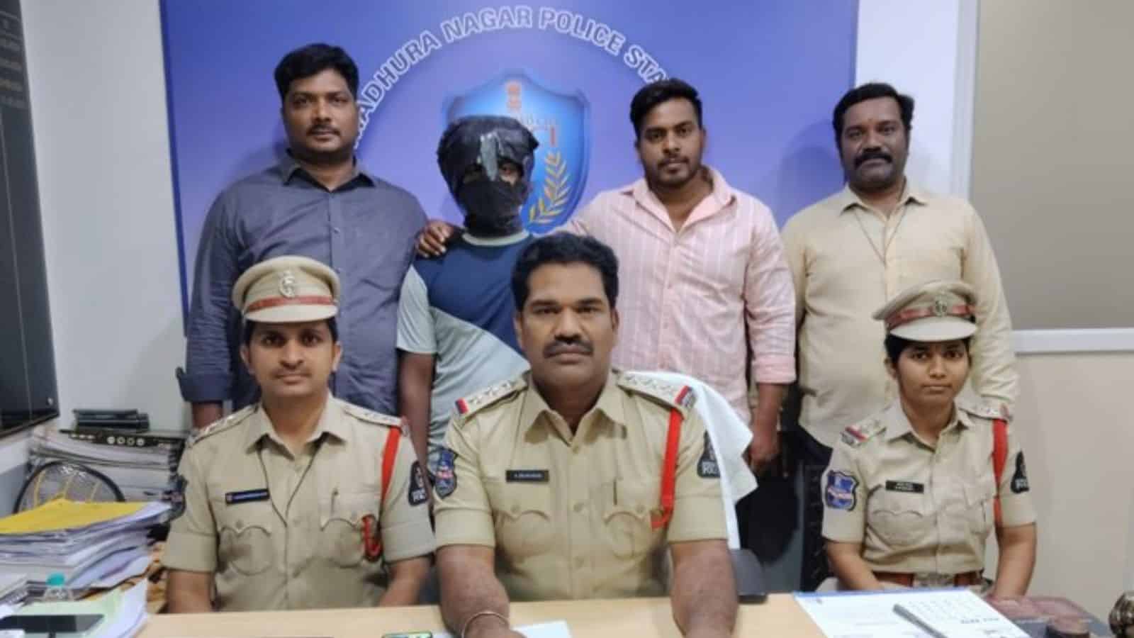 Police officers and officials at a press conference in Hyderabad.