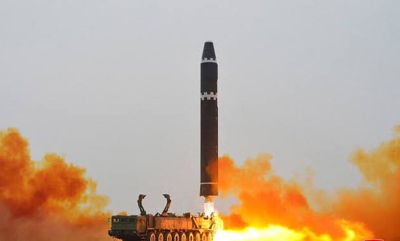 North Korean missile being launched into the sea amid rising tensions.