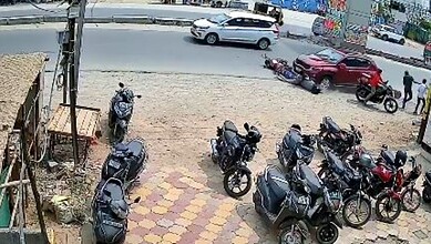 Car drags a man after accident in Hyderabad