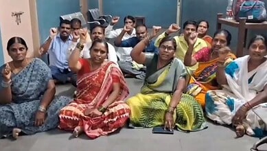 Group of contract workers protesting inside MGM hospital over unpaid wages in Telangana.