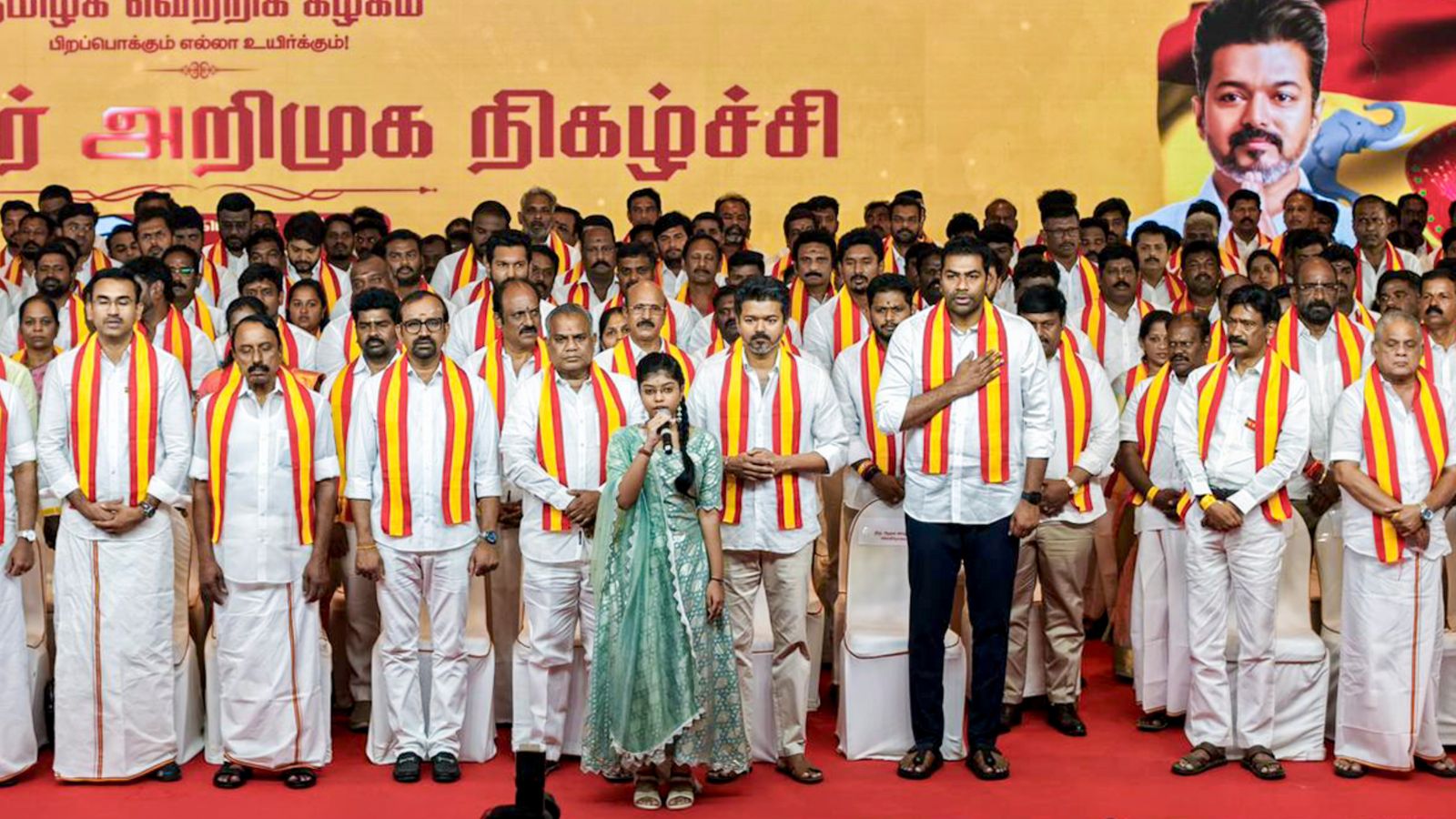 TVK President Vijay poses with his candidates for the Tamil Nadu elections