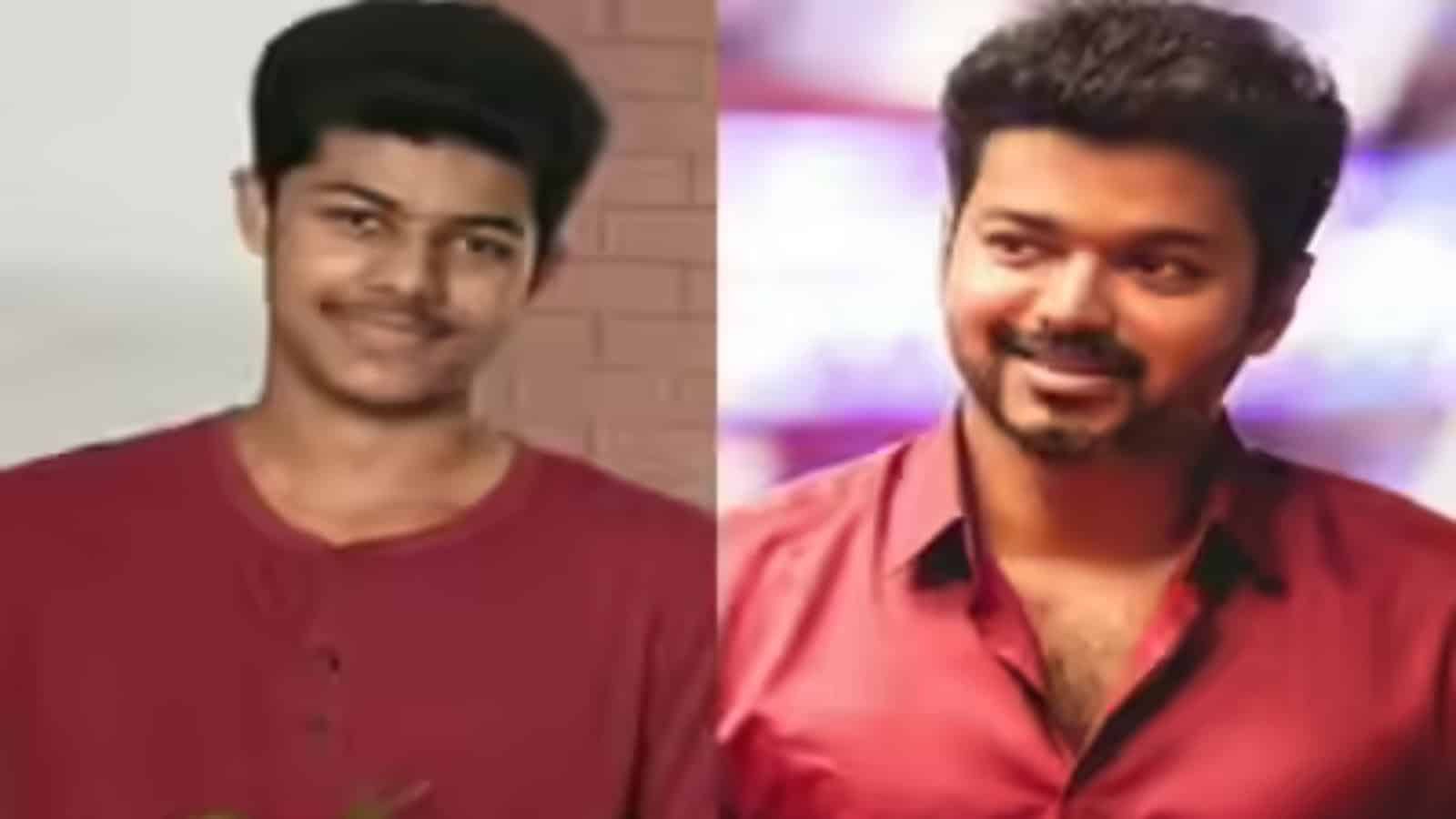 Young man with short black hair and a smile, wearing a maroon shirt, in a casual setting.