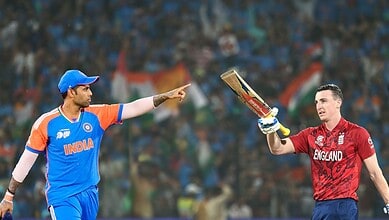 Umpires Gaffaney and Palekar officiate during the India vs England T20 World Cup semifinal match.