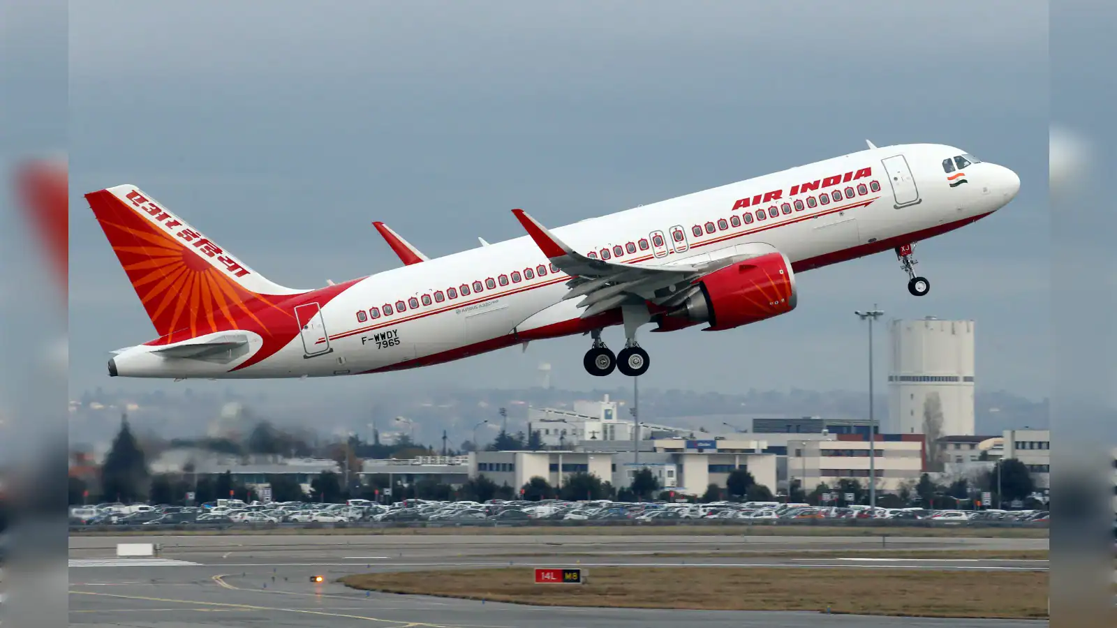 Air India aircraft taking off from runway amid Middle East flight disruptions.