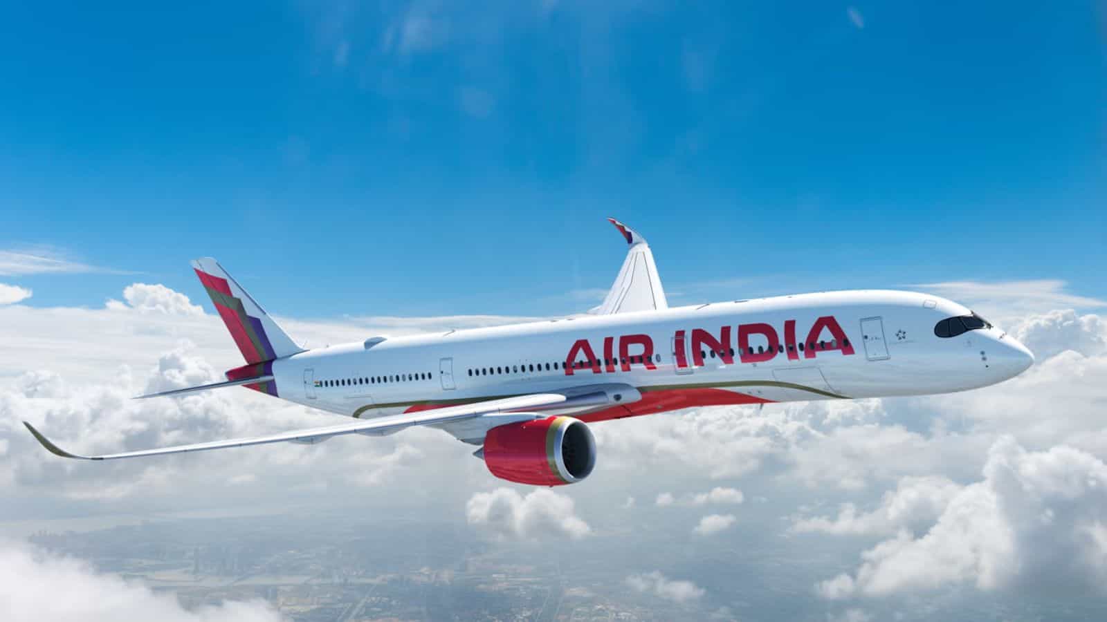 Air India aircraft flying above clouds, highlighting staff travel misuse investigation.