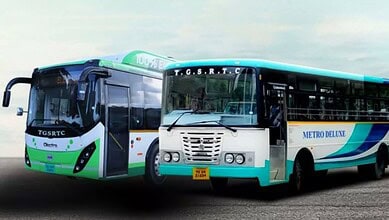 Two Hyderabad Metro buses, a Deluxe and an AC Metro, parked side by side, highlighting fare reduction.