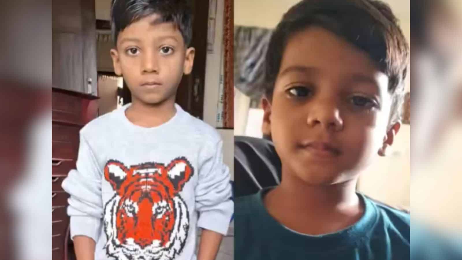 Young boy with serious expression, wearing a blue shirt, after battling a dog bite for 15 months.