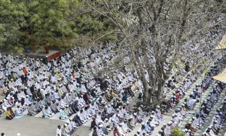 People from the Muslim community offer namaz on the eve of Eid al-Fitr festival, in Varanasi, Friday,