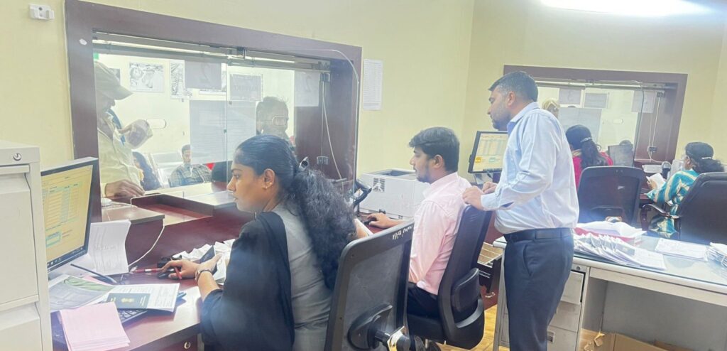 Embassy of India staff in Doha process passport applications for Indian nationals amid travel disruptions.
