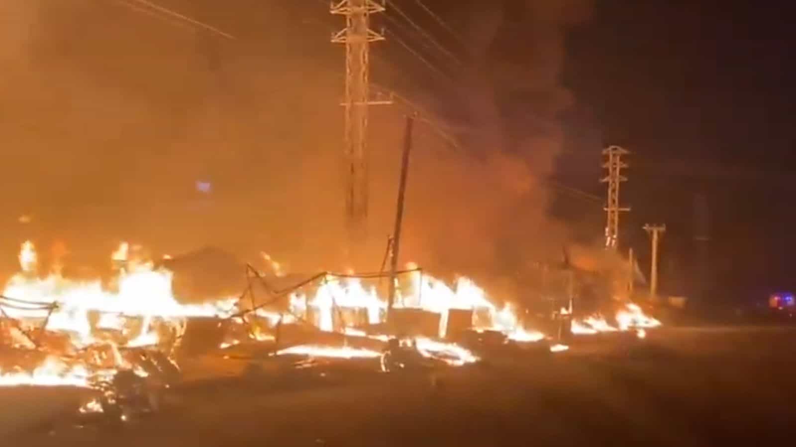 Burning high tension wires and damaged shops after fire in Bachupally, 20 shops gutted.