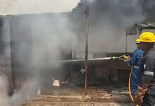 Fire at scrap shop in Hyderabad's KPHB Colony, with firefighters working to control the blaze and prevent.