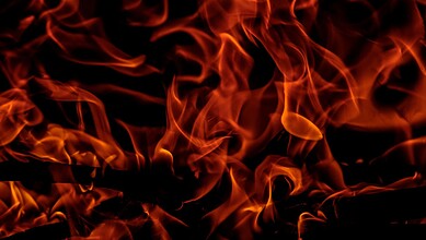 Flames and smoke engulf a residential building during a fire in Hyderabad's Begumpet.