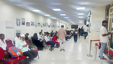 Indian passengers stranded in Doha waiting for their flight home.