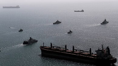 Iranian and Russian navy ships conduct a joint military drill in the Indian Ocean in an image released by the Iranian military.