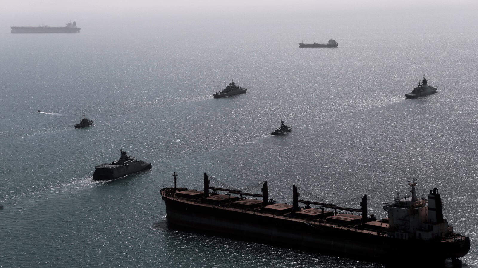 Iranian and Russian navy ships conduct a joint military drill in the Indian Ocean in an image released by the Iranian military.