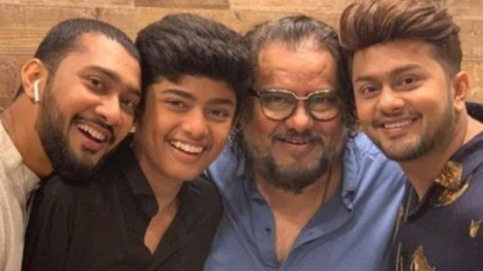 Family enjoying a joyful moment together, highlighting religious diversity and unity.