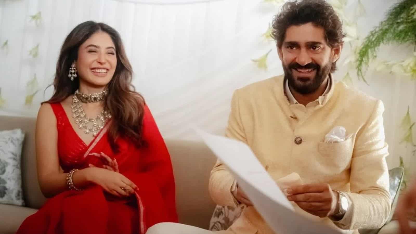 Kritika Kamra and Gaurav Kapur smiling together at a media event.