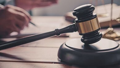 Gavel and legal documents representing judicial proceedings related to Telangana's postponed National Lok.