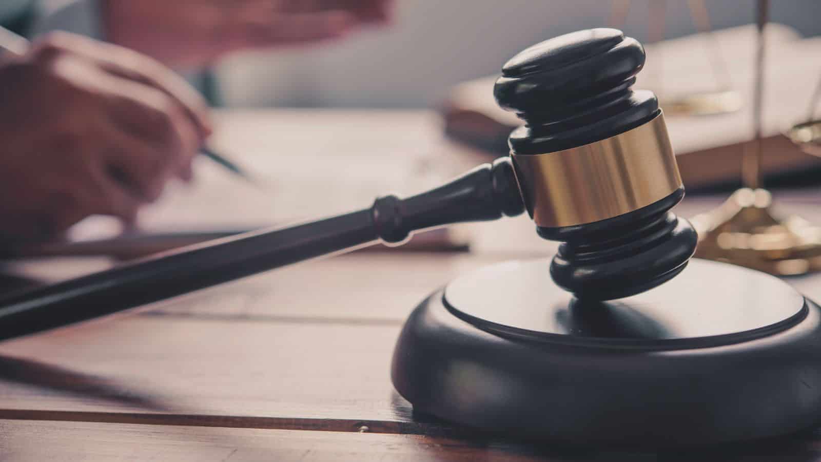 Gavel and legal documents representing judicial proceedings related to Telangana's postponed National Lok.