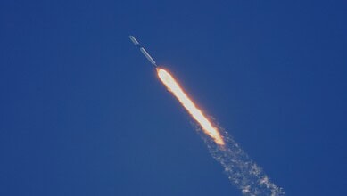 Iranian missile streaks across the sky during a strike in the UAE, causing casualties including Indian na.
