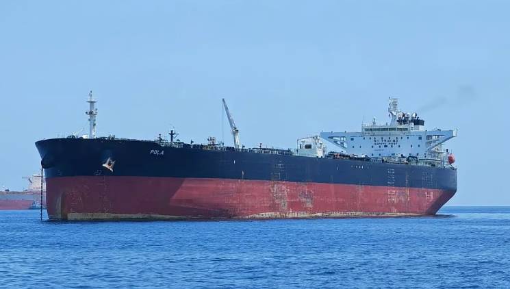 Oil tanker ship navigating open waters, showcasing maritime transportation and shipping industry.