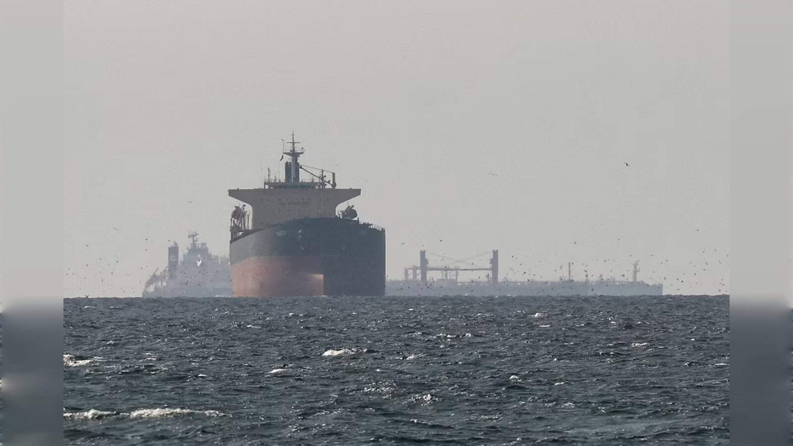 Oil tanker in the sea, related to underwater drone attack near Iraq, linked to recent geopolitical tensio.