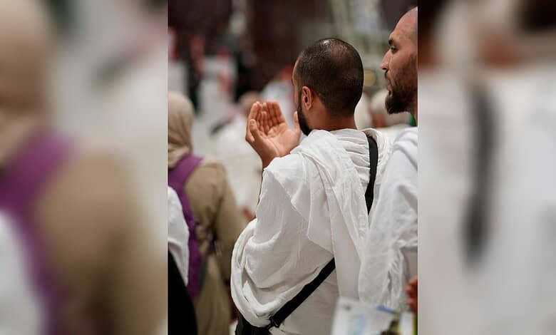 Pilgrim making dua at Masjid Al-Haram in Makkah during Ramzan night prayers.