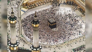 Aerial view of thousands of pilgrims performing Tawaf around the Kaaba at the Grand Mosque in Makkah.