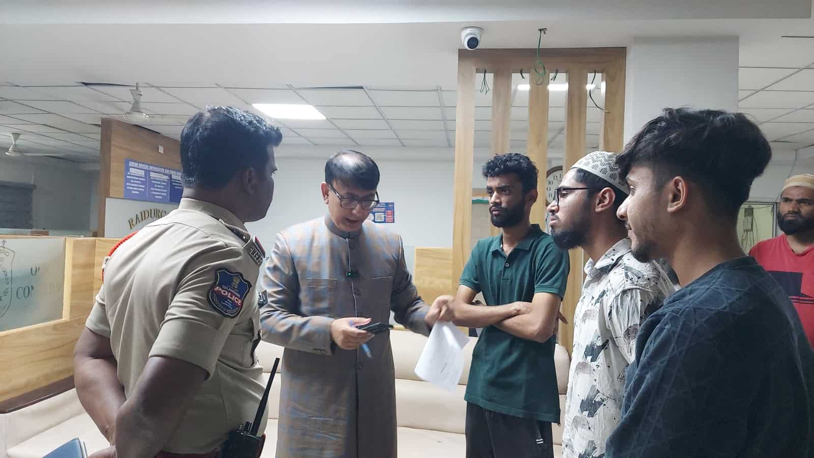 Amjed Ullah Khan and youths at Raidurgam police station in Hyderabad.
