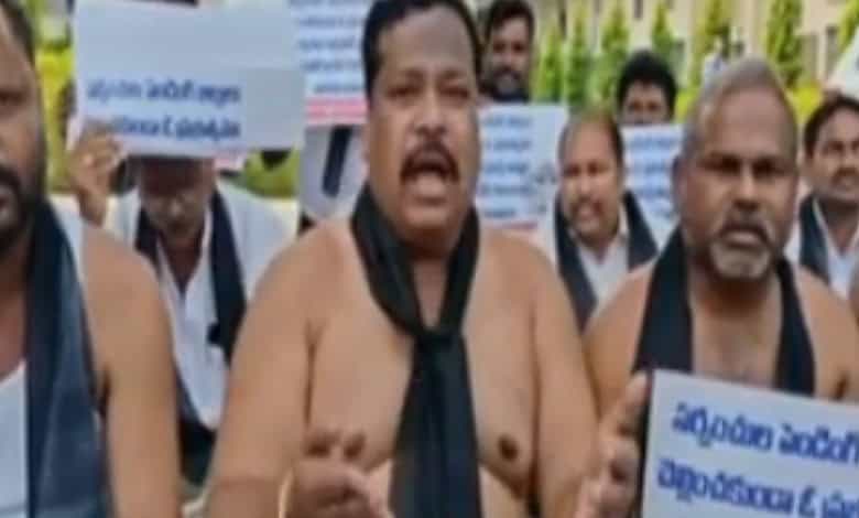The image shows former sarpanches protesting at Suryapet District Collectorate demanding the payment of their bills on Monday, March 9.