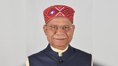 Shiv Pratap Shukla, Indian politician, wearing a colourful traditional cap and formal attire.