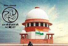 Supreme Court of India building with Indian flag, symbolising judicial authority and national pride.