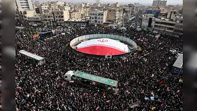 Massive crowd gathers in Tehran for funeral of commanders amid rising Gulf tensions.