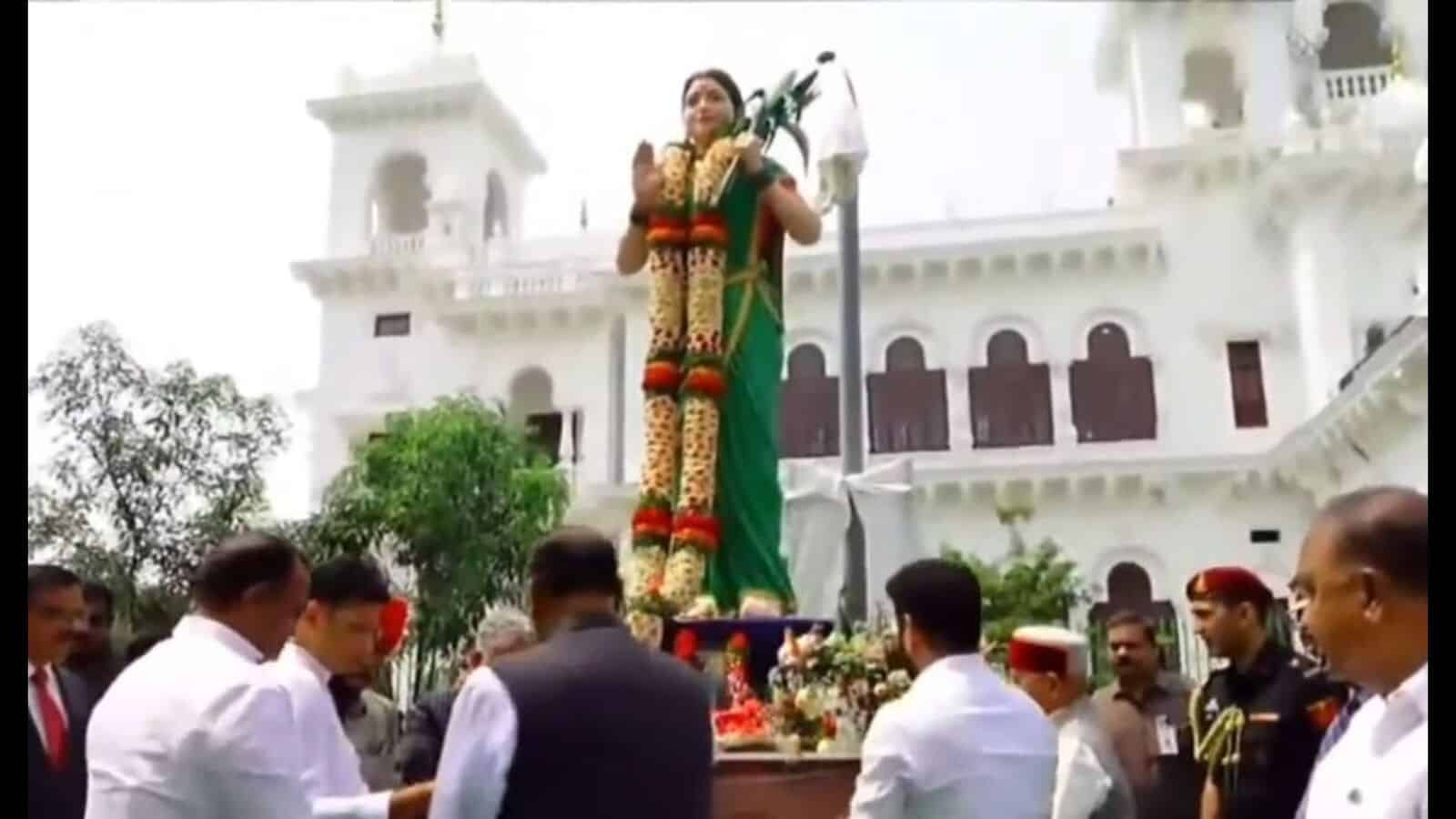 Telangana government officials and dignitaries unveil the Telangana Thalli statue at the legislature prem.