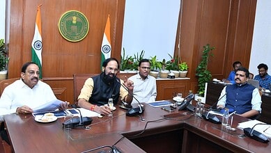 Telangana Minister Uttam Kumar discusses domestic LPG supply during a government meeting.