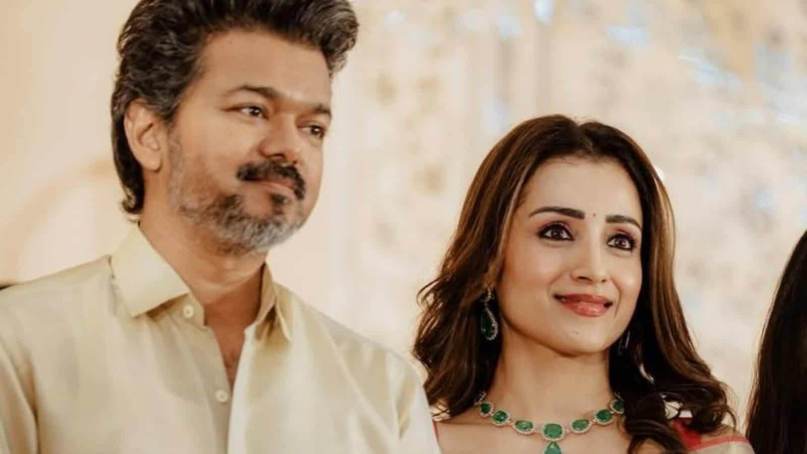 Thalapathy Vijay and Trisha Krishnan attending a wedding celebration together.