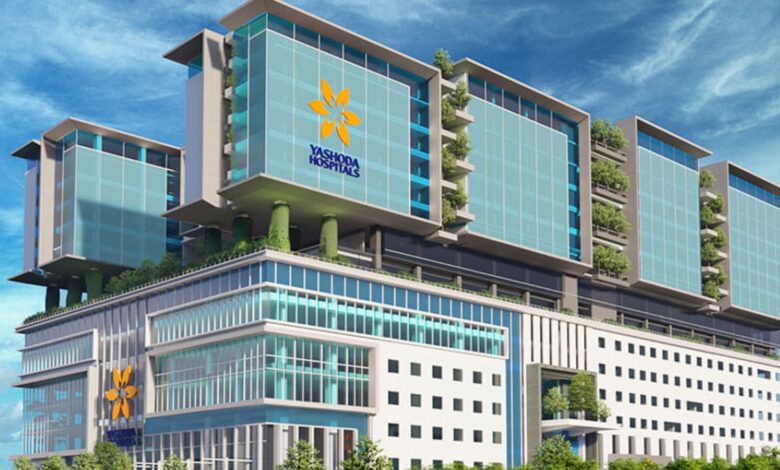 Image shows Exterior view of Yashoda Hospitals, a modern multi-storey healthcare facility in Hyderabad.