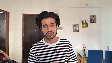 E-sports player sitting in a Mumbai flat, looking concerned, highlighting issues of discrimination agains.