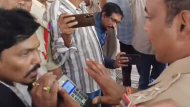 The image shows Punjagutta police conducting breath analyser test on advocate Subba Rao who alleged threats from singer Mangli.