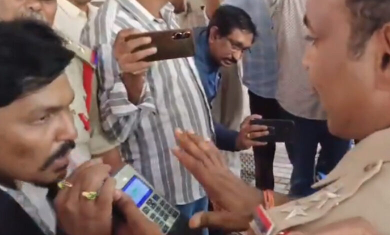 The image shows Punjagutta police conducting breath analyser test on advocate Subba Rao who alleged threats from singer Mangli.
