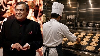 Chef preparing rotis in a professional kitchen, showcasing culinary skills for luxury dining.