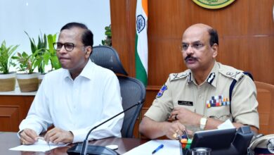 The image shows Telangana chief Secretary K Ramakrishna Rao and DGP B Shivadhar Reddy holding a review of the Arrive Alive programme being held in the state from April 13 to 18.