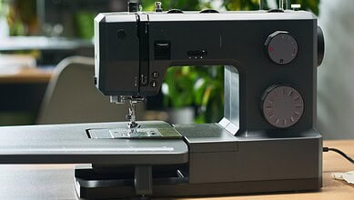 Sewing machine used by women in Telangana to receive free training and support under government scheme.